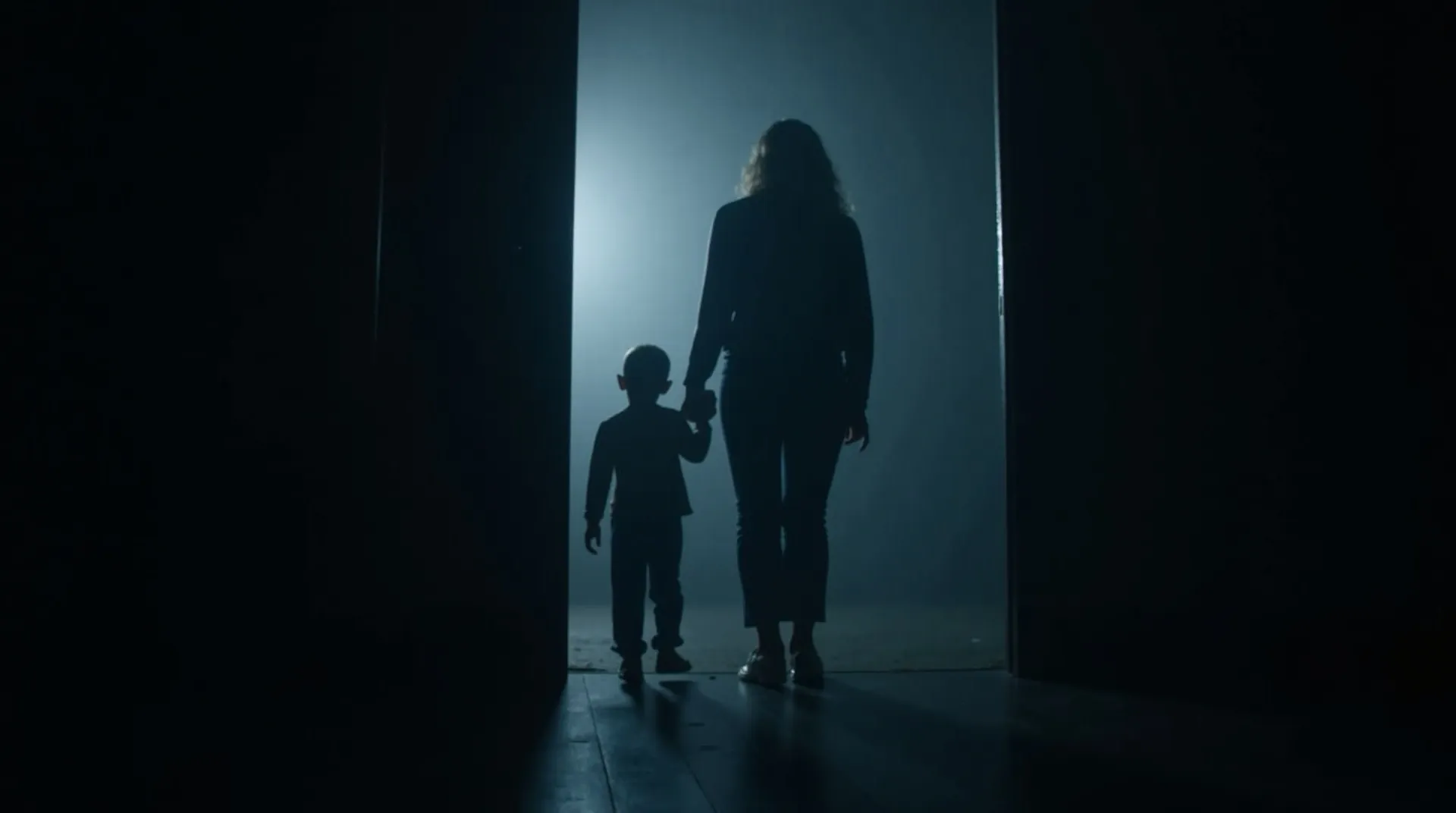 Parent holding a child in a child protection case